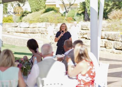 Event hosting at a wedding reception, with The Algarve Celebrant engaging guests alongside Pulse Entertainment, ensuring a lively and seamless celebration.