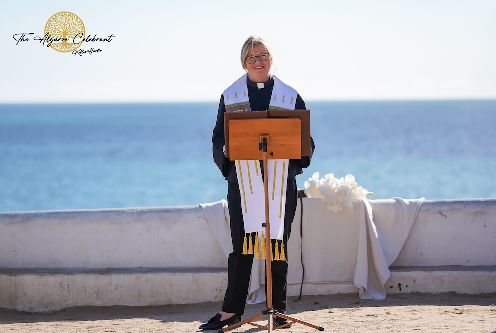 The Chapel at Senhora da Rocha: A stunning white chapel perched on a clifftop overlooking the Atlantic Ocean, surrounded by the natural beauty of the Algarve coastline.