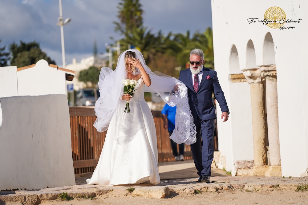 Daniels father Walking Magdalena Down the Aisle: A touching moment as Daniel’s father walks Magdalena down the aisle inside the historic Senhora da Rocha chapel.