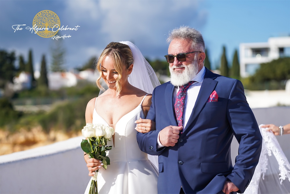 Daniels father Walking Magdalena Down the Aisle: A touching moment as Daniel’s father walks Magdalena down the aisle inside the historic Senhora da Rocha chapel.