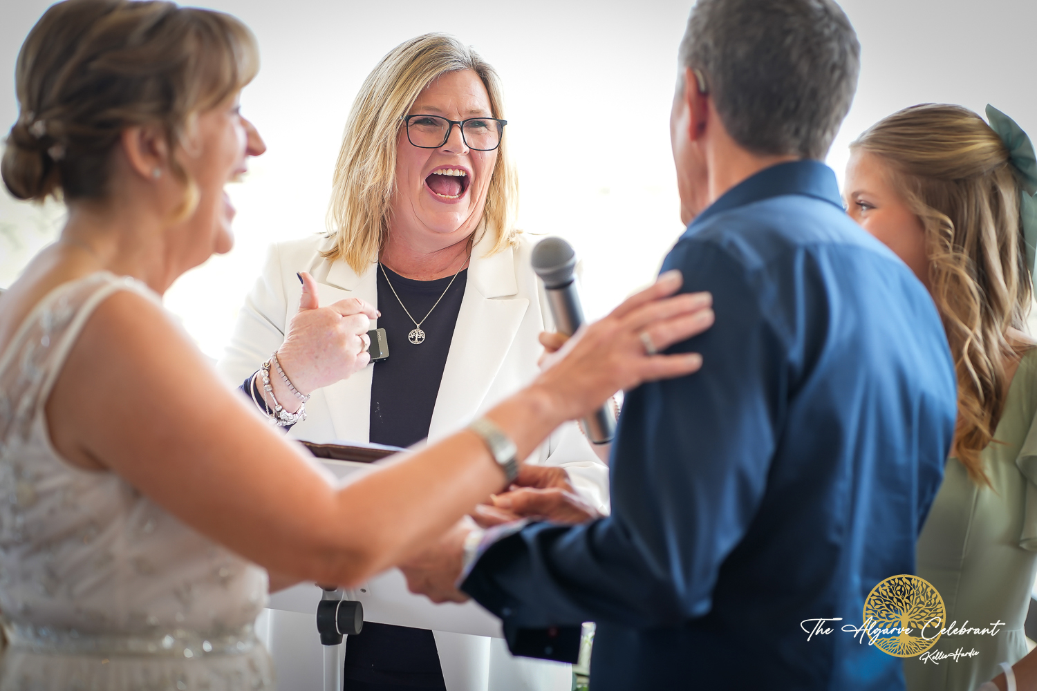 Alan and Marilyn standing together during the ceremony – Alan and Marilyn exchanging vows. Alan and Marilyn standing together during the ceremony – Alan and Marilyn exchanging vows.
