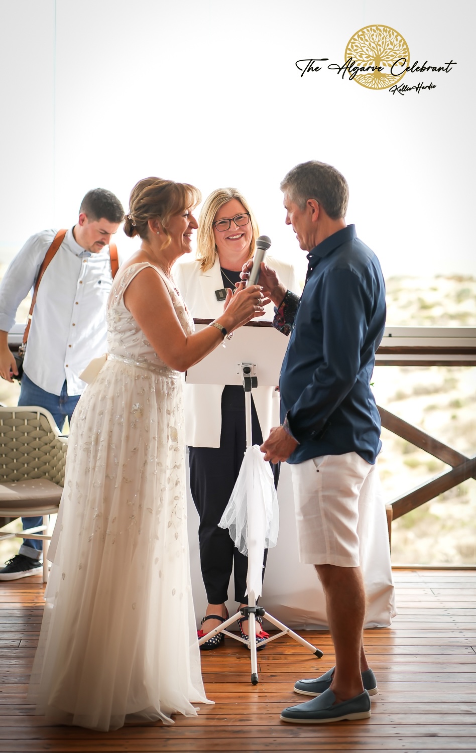 Alan and Marilyn standing together during the ceremony – Alan and Marilyn exchanging vows. Alan and Marilyn standing together during the ceremony – Alan and Marilyn exchanging vows.