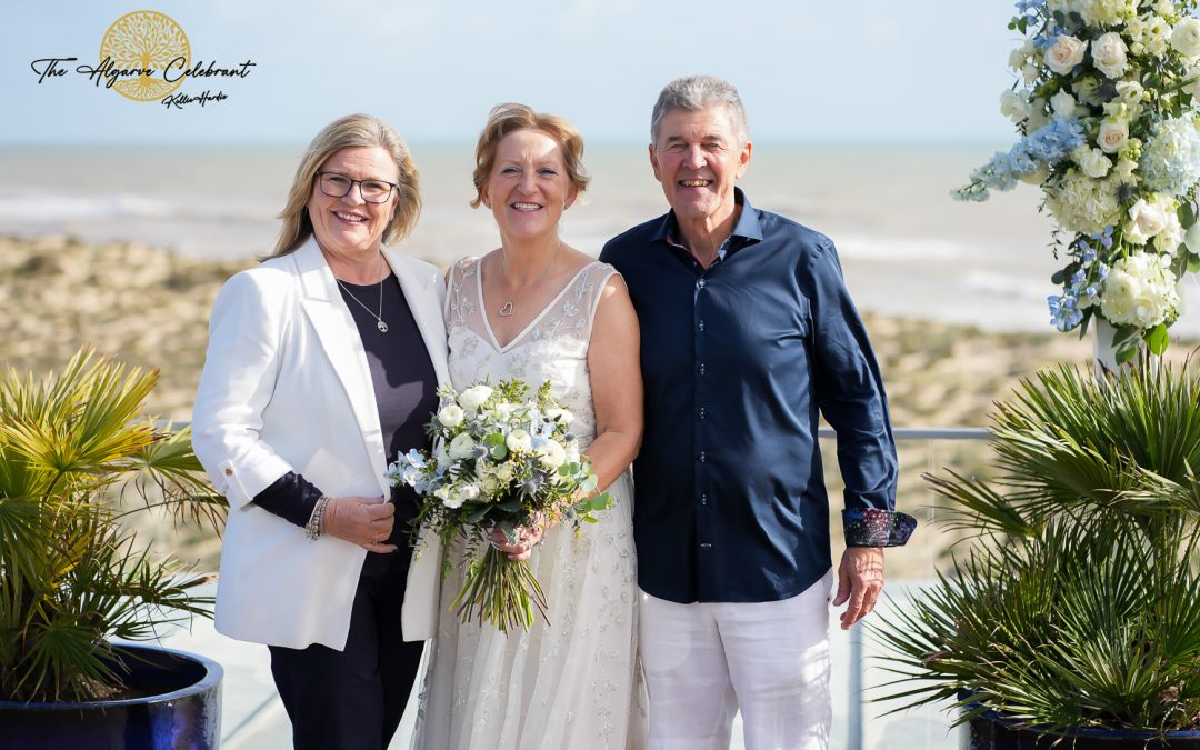 Alan and Marilyn standing together after the ceremony – with their Celebrant - Kellie Hardie The Algarve celebrant